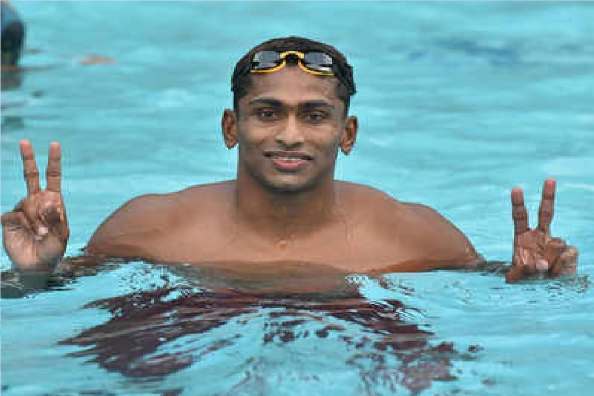 asian games 2018 swimmer sajjan prakash Family trapped in keral flood