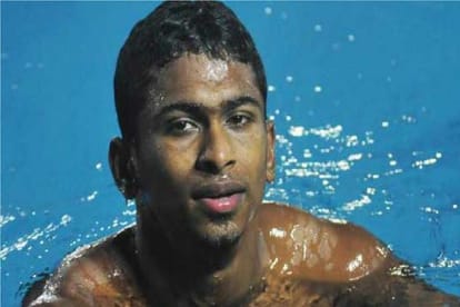 asian games 2018 swimmer sajjan prakash Family trapped in keral flood