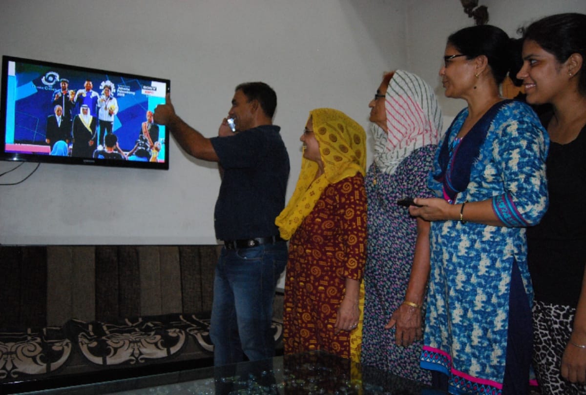 asian games 2018: lakshay wins silver in jakarta and celebration at his india home see in photos