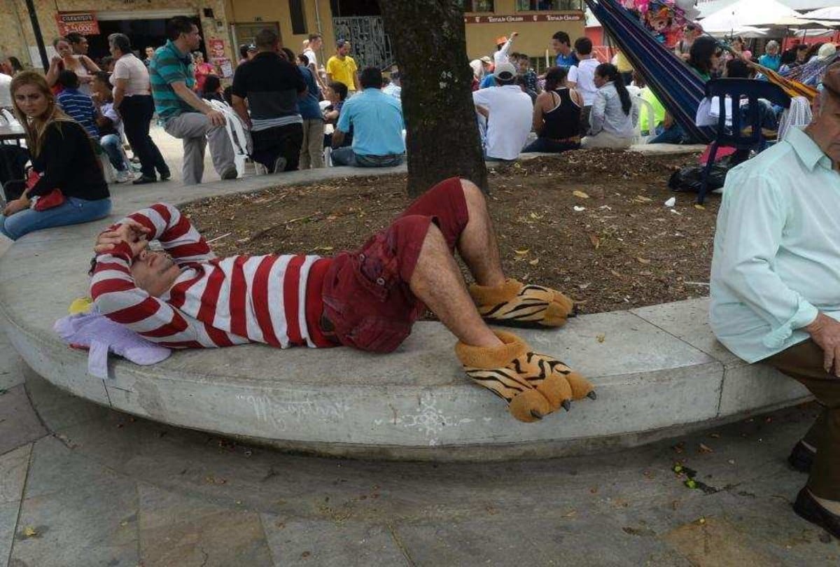 Lazy people sleeps on the road on world day of laziness at Colombia