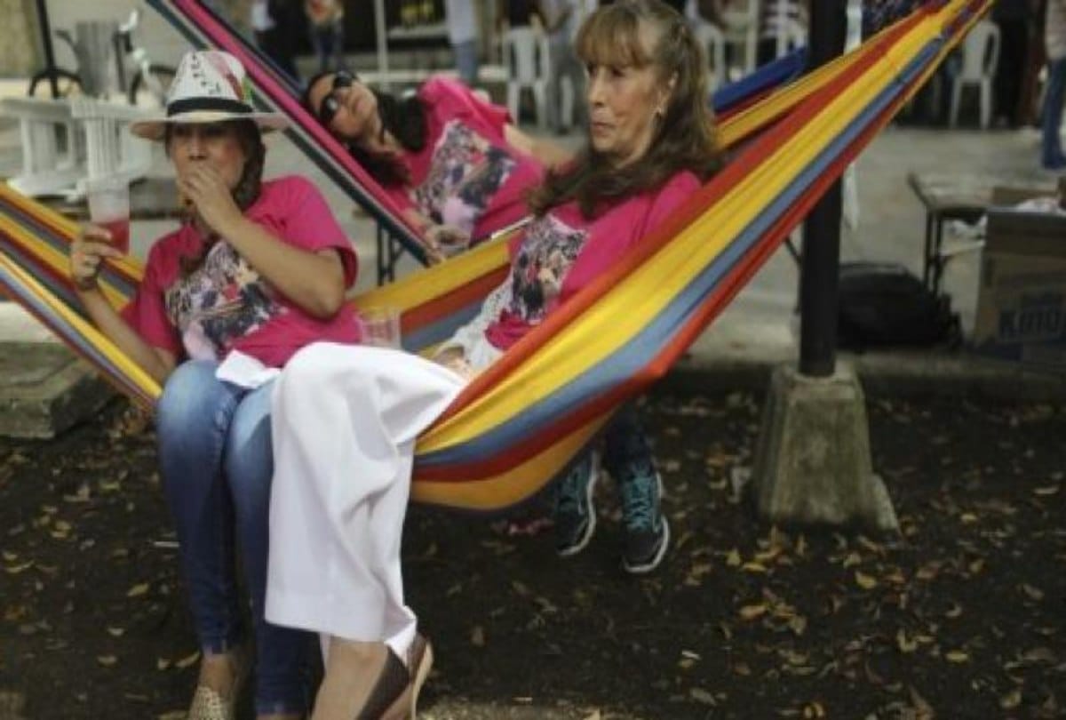 Lazy people sleeps on the road on world day of laziness at Colombia