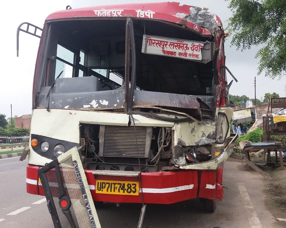 bus entered into truck, 10 injured