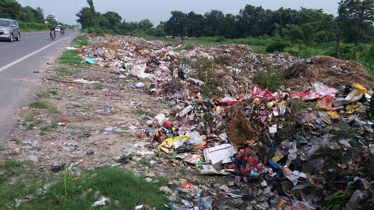Dirt being dumped along the highway