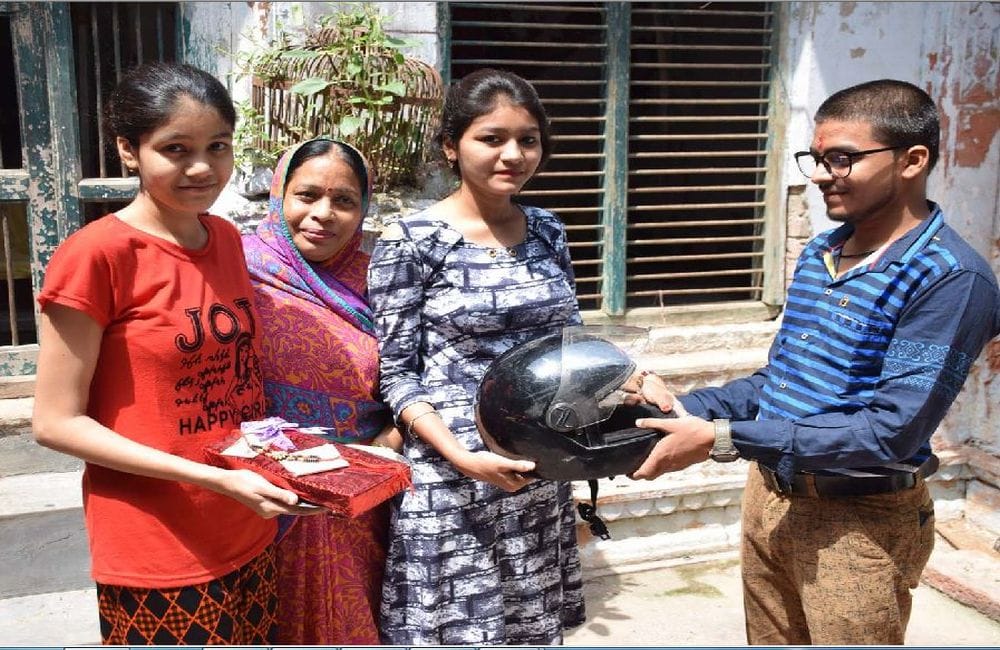 rakshabandhan celebration with helmets gifts in mathura