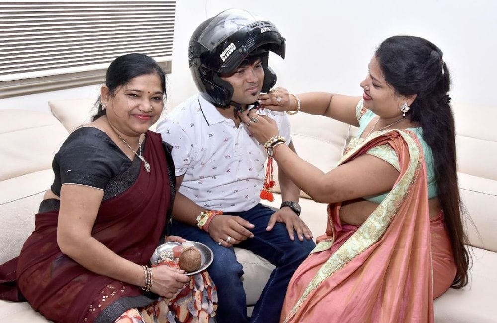 rakshabandhan celebration with helmets gifts in mathura