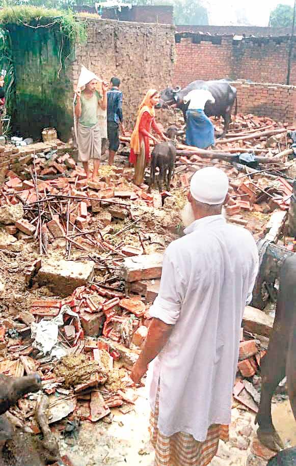 12 houses demolished in rain