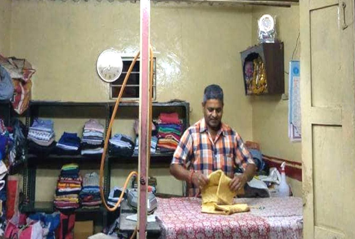 Luandrymen using LPG Iron Box to press clothes insted coal and electric iron