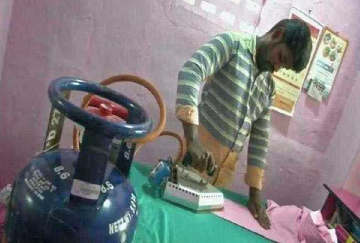 Luandrymen using LPG Iron Box to press clothes insted coal and electric iron
