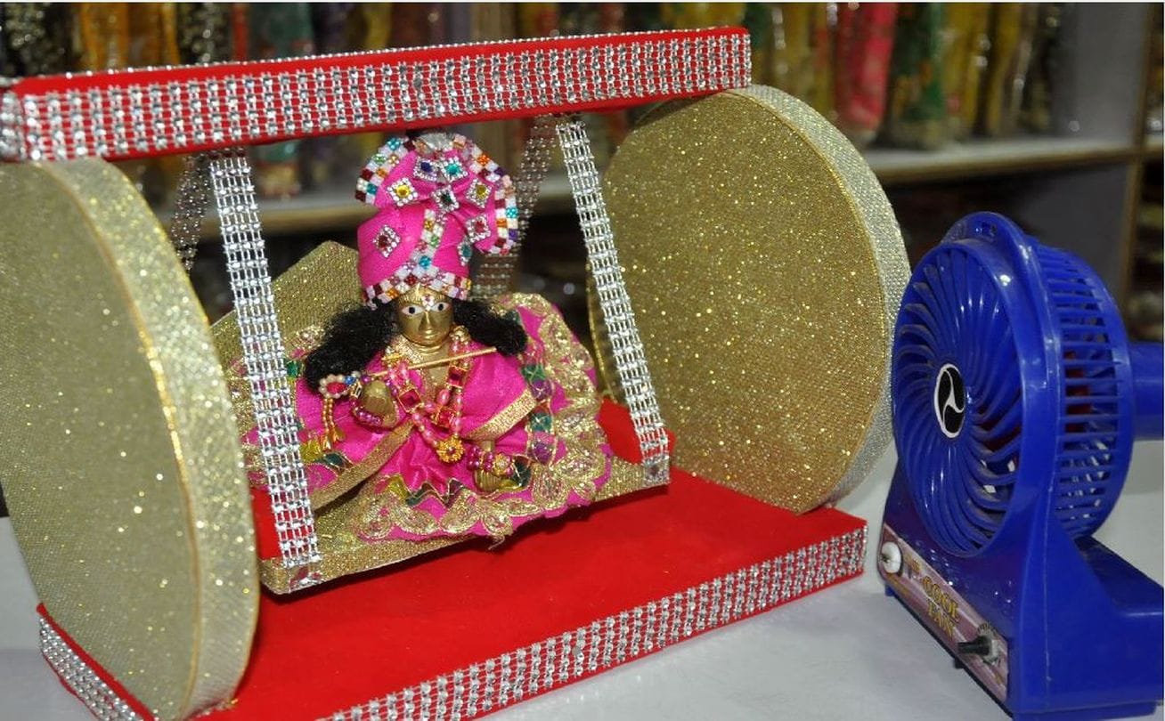In Janmashtami, goods of Lord Krishna are selling in the market at Agra