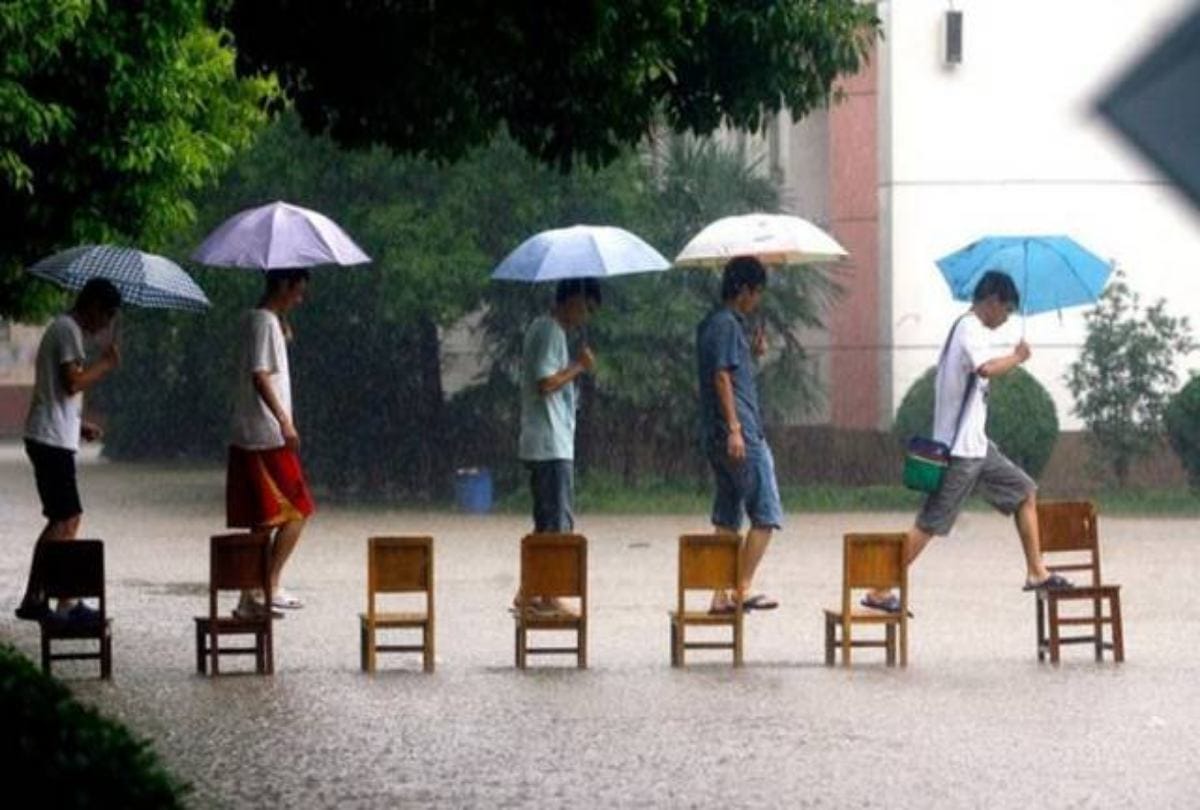 Rain Funny Photo Hillarious Ways People Cope With Water logging And Heavy Downpour