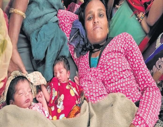 miffed with birth of twin daughters,mother left them,fed them after 11 hours when doctors convinced