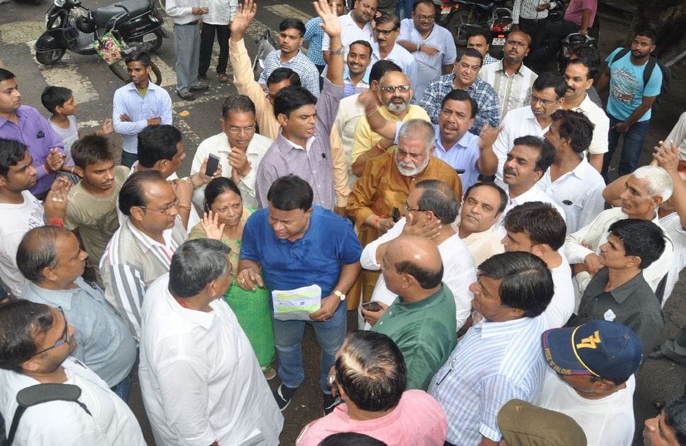 people protest against SC-ST Act outside BJP MP house in agra