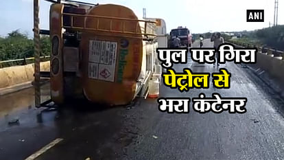 LOCALS LOOTED RUSH TO COLLECT LEAKING PETROL CONTAINER TRUCK TOPPLES IN KALABURAGI