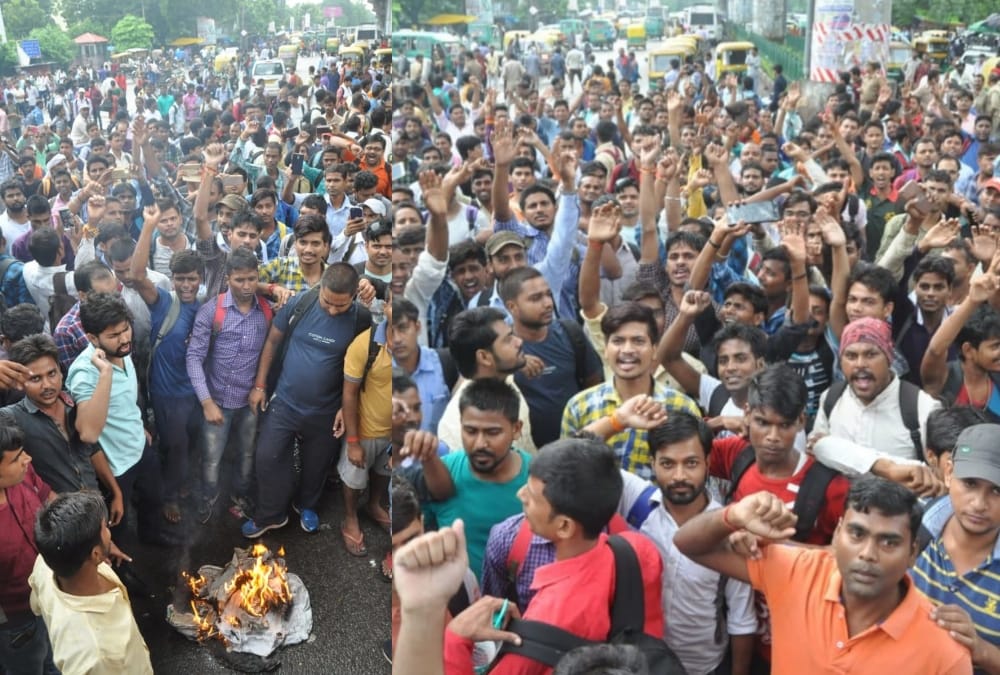 protest by applicants in tubewell operators paper leak case.