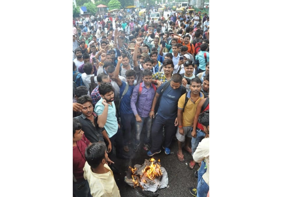 protest by applicants in tubewell operators paper leak case.