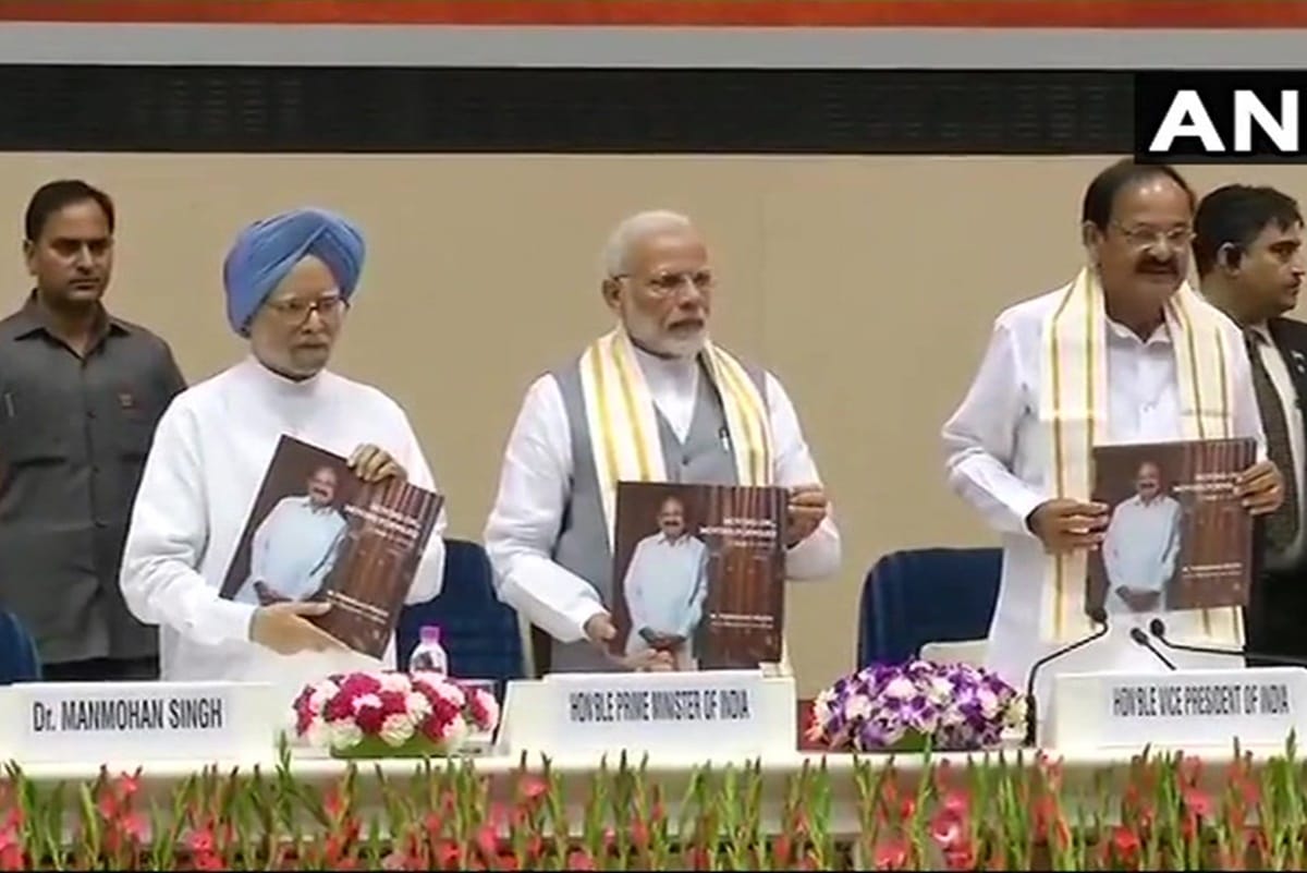 PM Modi and former PM Singh at the launch of Vice President Venkaiah Naidu book