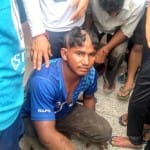 पिटाई के बाद युवक सिर मुंडवाया