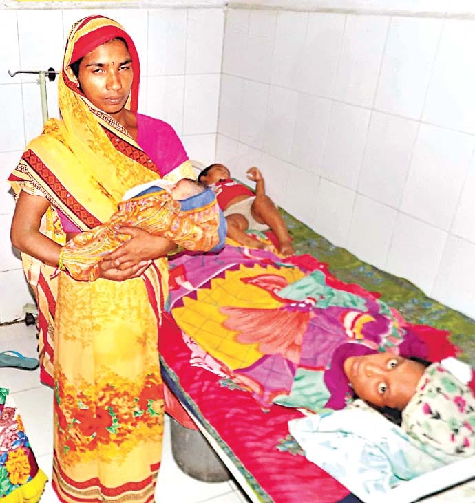 gave birth baby girl to travell 12 km in flood in amroha