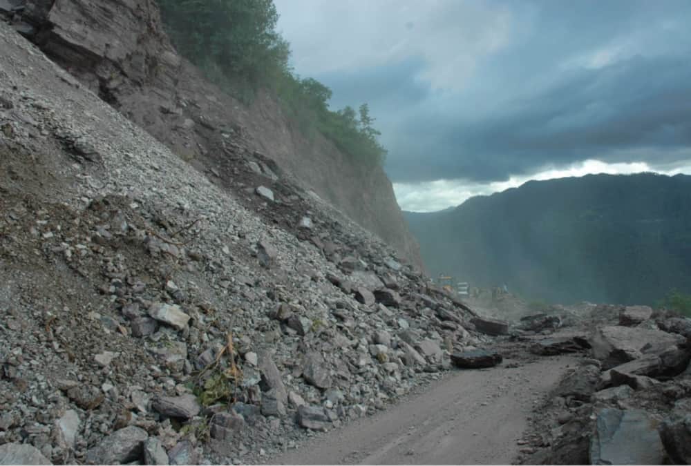 Stone Rain on All Weather Road after mountain collapse pithoragarh highway