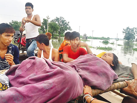 Flood spread in many flood affected areas, sent by boat to Lohia