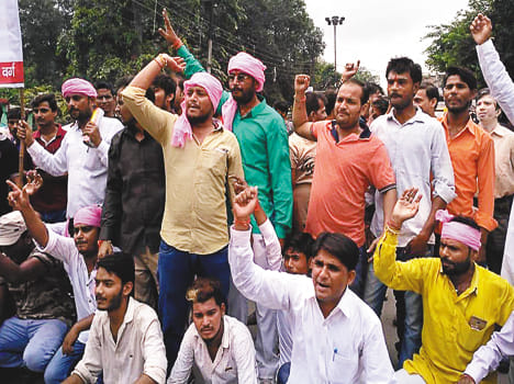 Opposition in supporters of India in protest against SCST Act