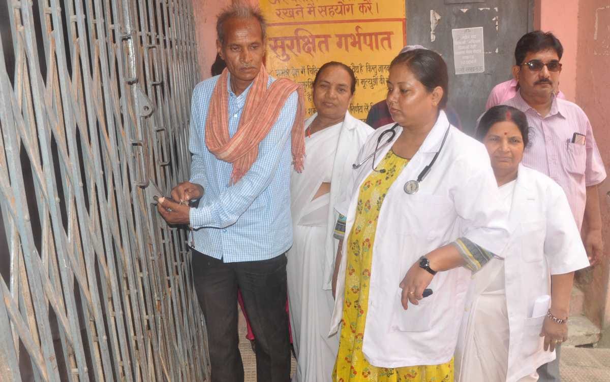 Medical employees gate lock of women hospital in mau