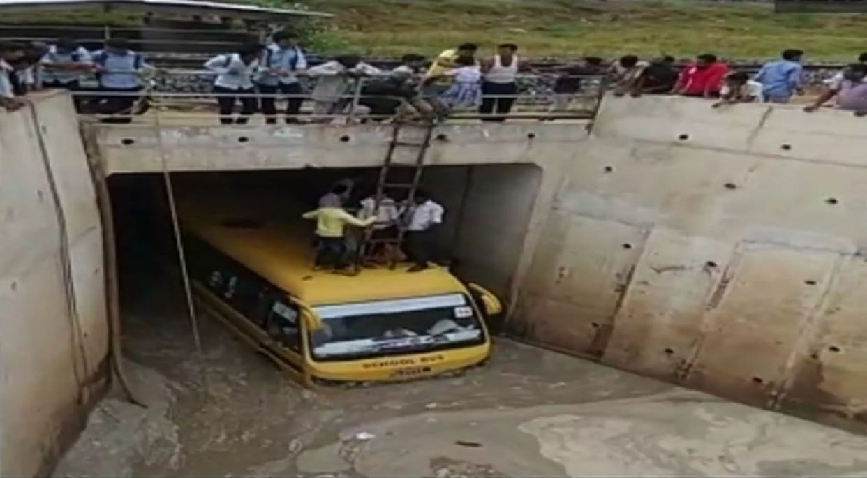 School Bus rescued form water-filled underpass in sikar, 100 children were sitting in a 60-seat bus