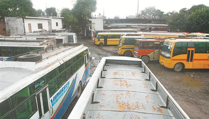 Private bus out of town, three places for parking