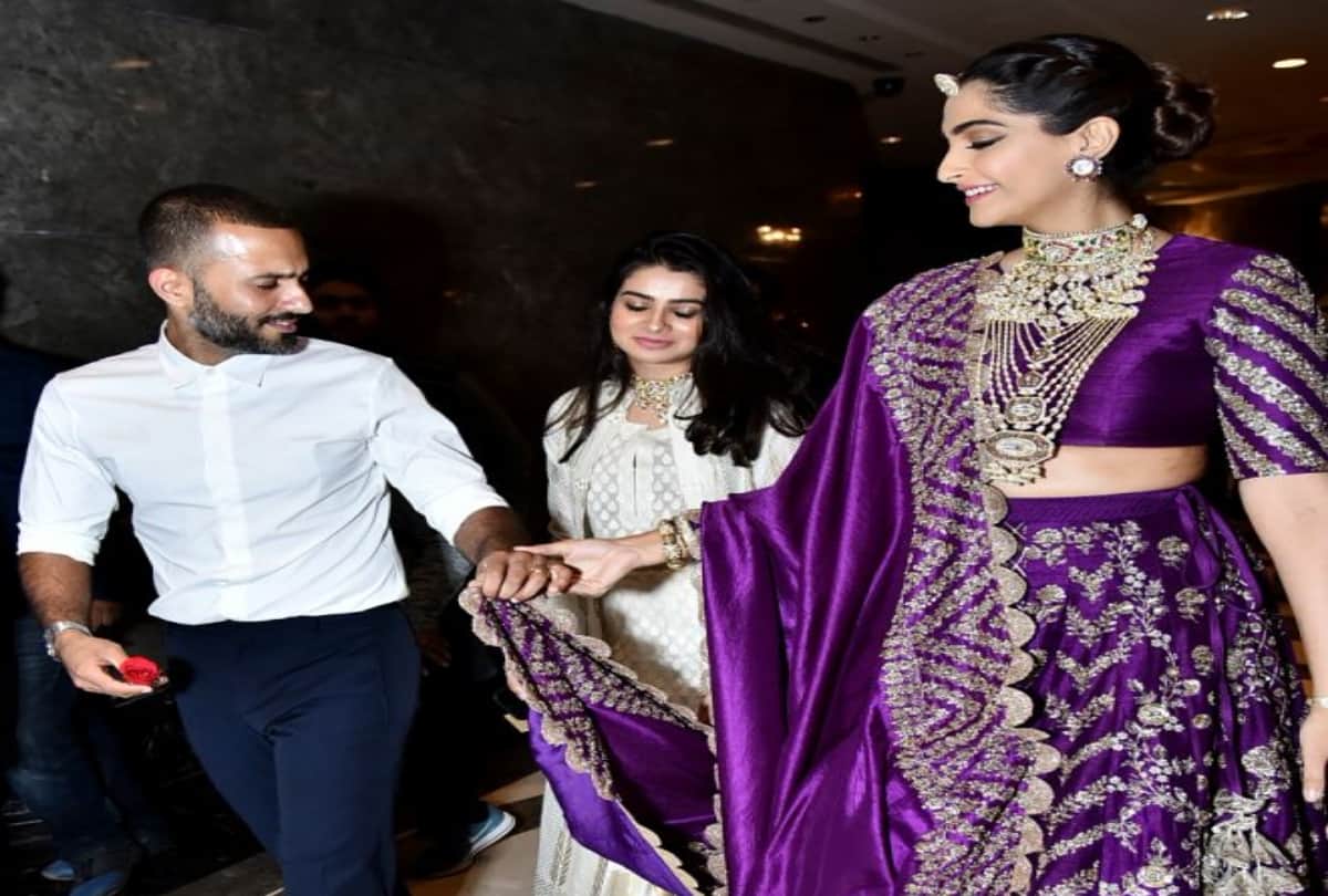 Sonam Kapoor in bride avatar husband anand ahuja holds her dupatta