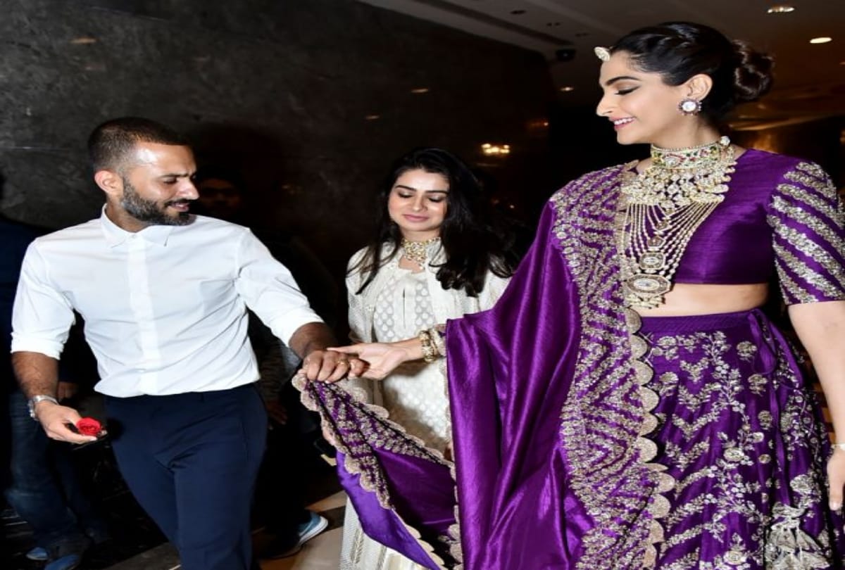 Sonam Kapoor in bride avatar husband anand ahuja holds her dupatta