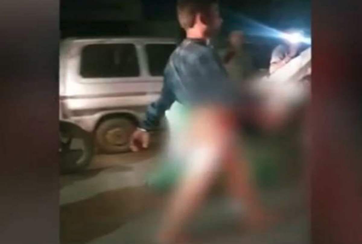 RAJKOT WIFE DRAGGING HUSBAND TO POLICE STATION NAKED