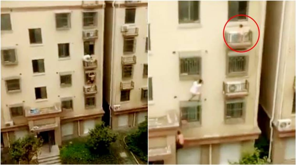 3 year old girl trapped on fourth floor window rescued by two people in China