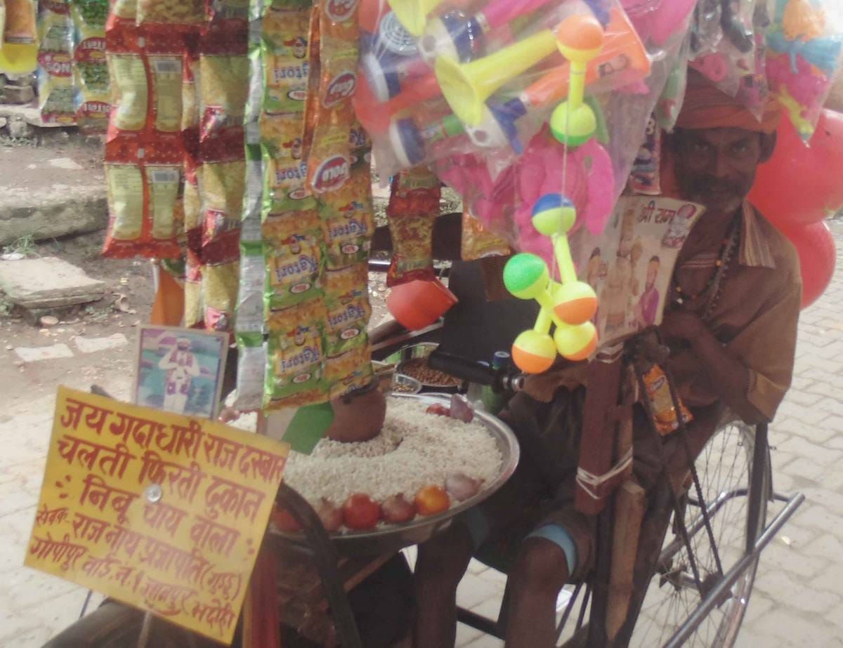 This man made shop on tricycle and maintain his family