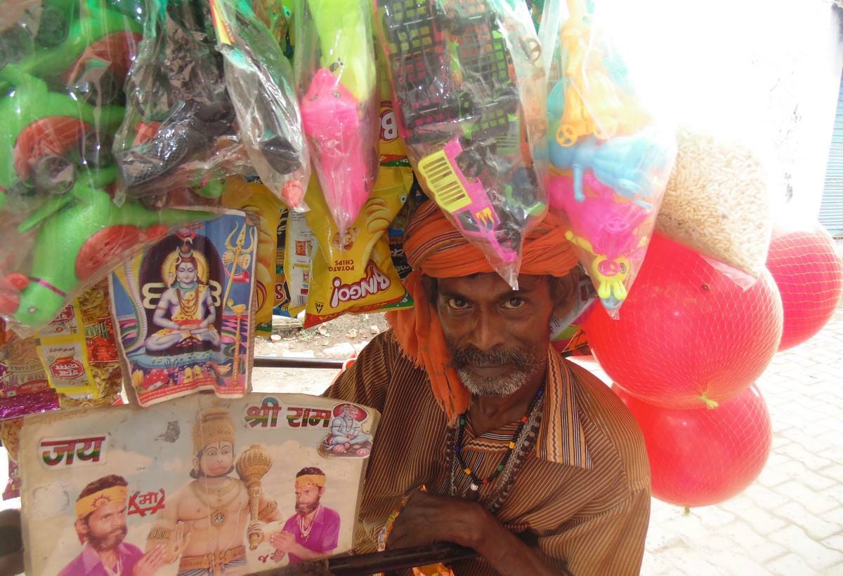 This man made shop on tricycle and maintain his family