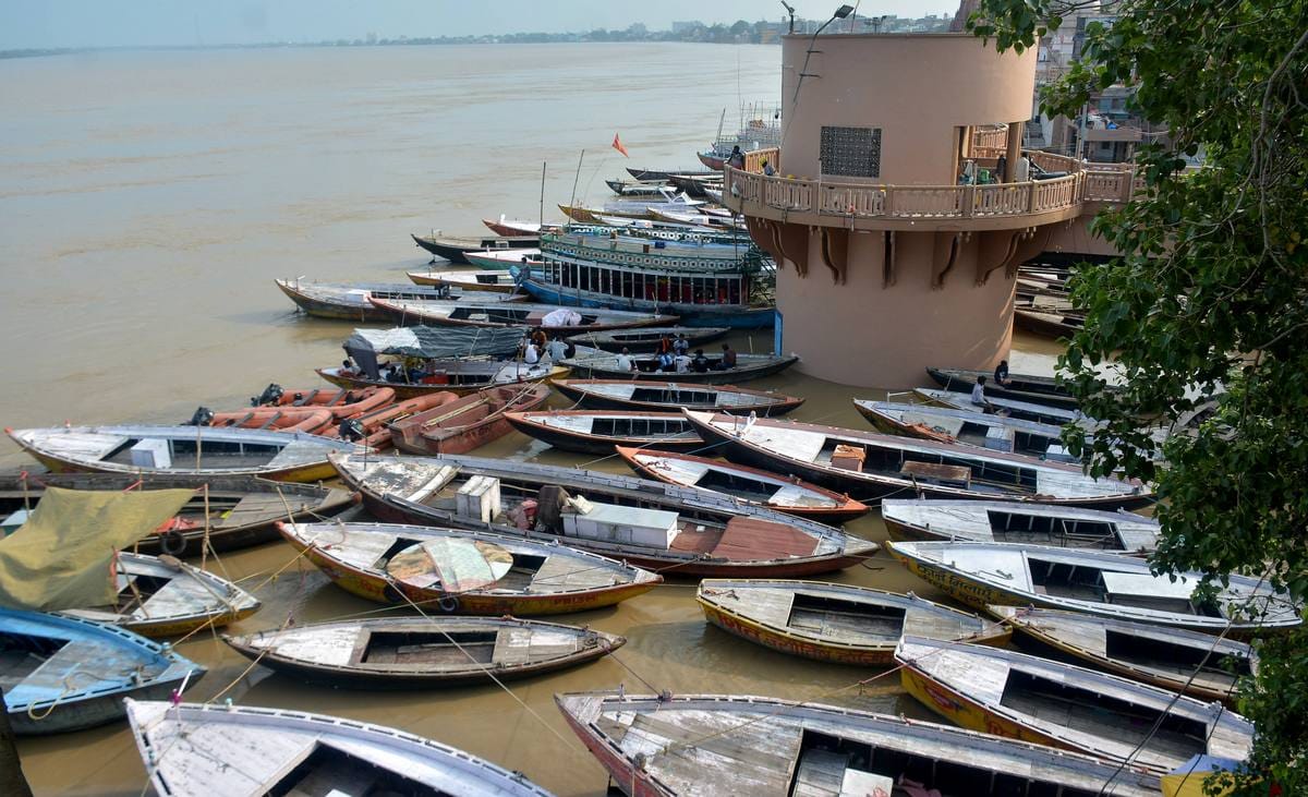 Ganga river water level increasing very fast in varanasi boats float in street