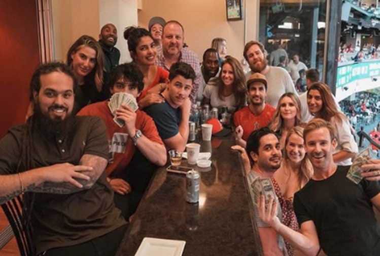 priyanka chopra kiss her fiancee nick jonas at baseball stadium
