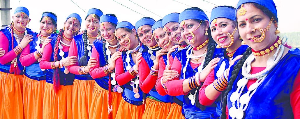 Artists present a colorful show at the Nanda Devi Fair