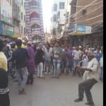 अलम का जुलूस निकालते अलमदार।