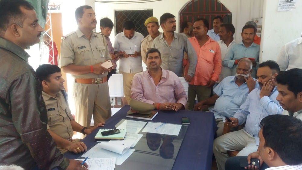 fighting with two inspectors