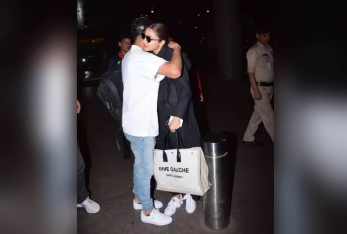 virat anushka shares adorable moment while leaving from airport as they hug each other delhi ncr