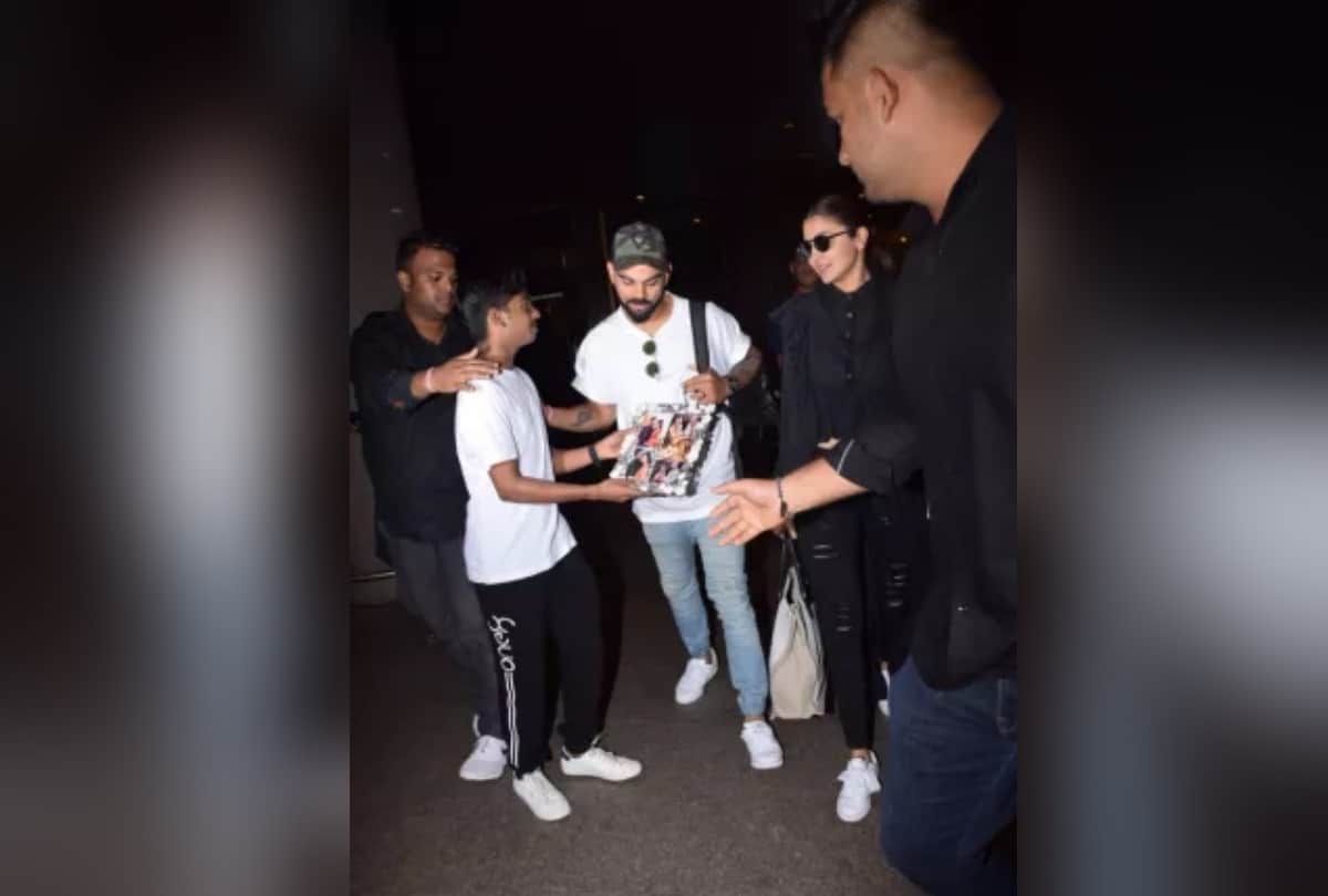virat anushka shares adorable moment while leaving from airport as they hug each other delhi ncr