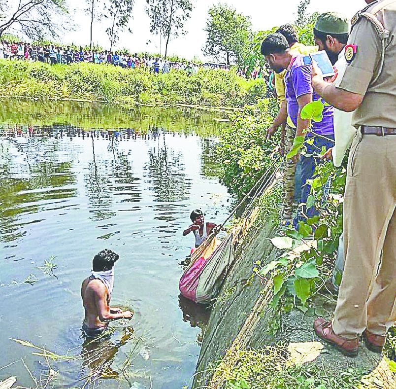 The body of the woman killed in the pond