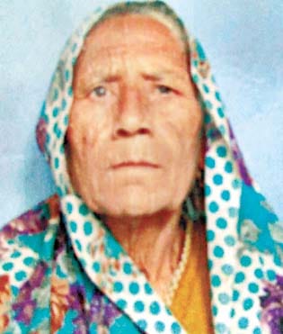 women shot dead in outside house.