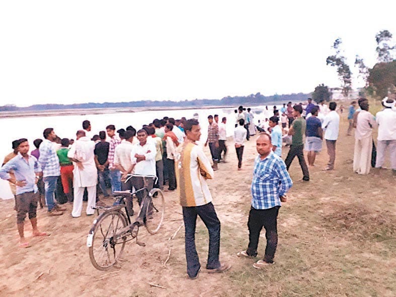 dead body of young foun on the river bank
