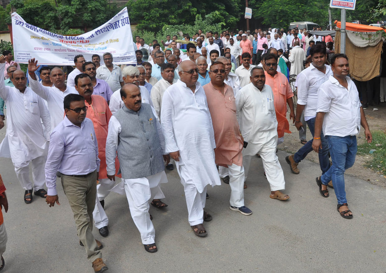 Misbehaving with college principal teachers are protesting