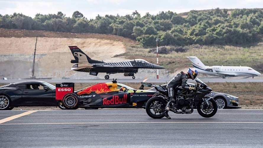 fighter plane ,formula one car,and super bike took participate in race together