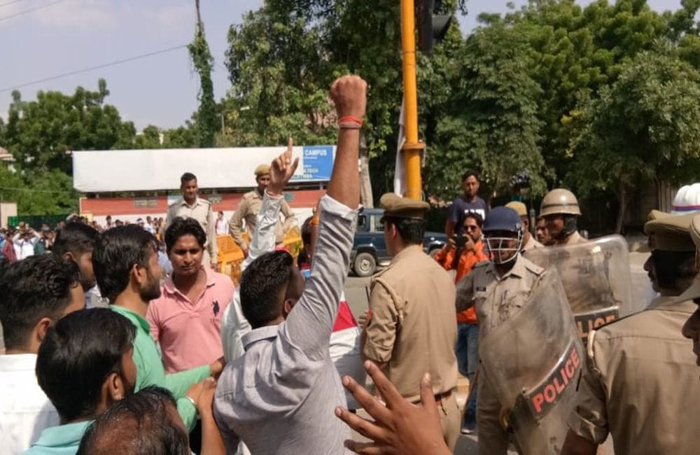 Teachers protest outside the VC office in Delhi University