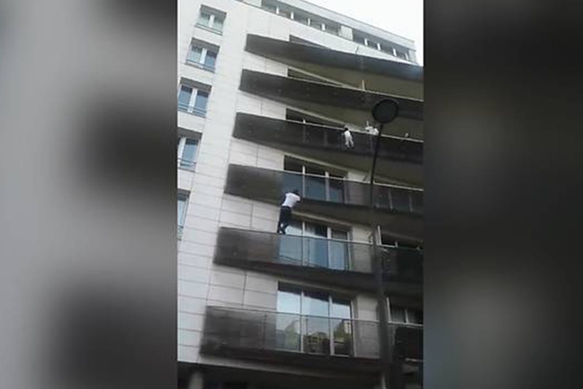court will charge father of boy saved by spiderman in Paris balcony with negligence