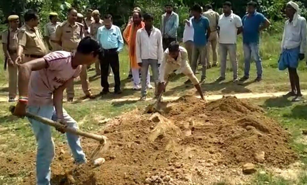 dead body dug out