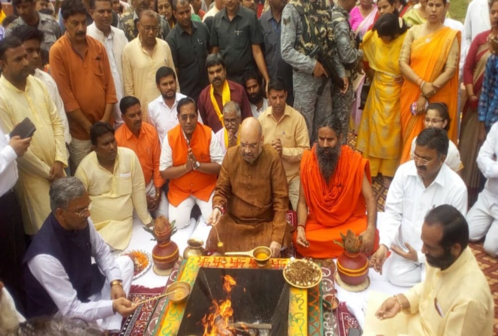 Live updates Bjp president Amit shah arrives in patanjali haridwar Acharyakulam inauguration